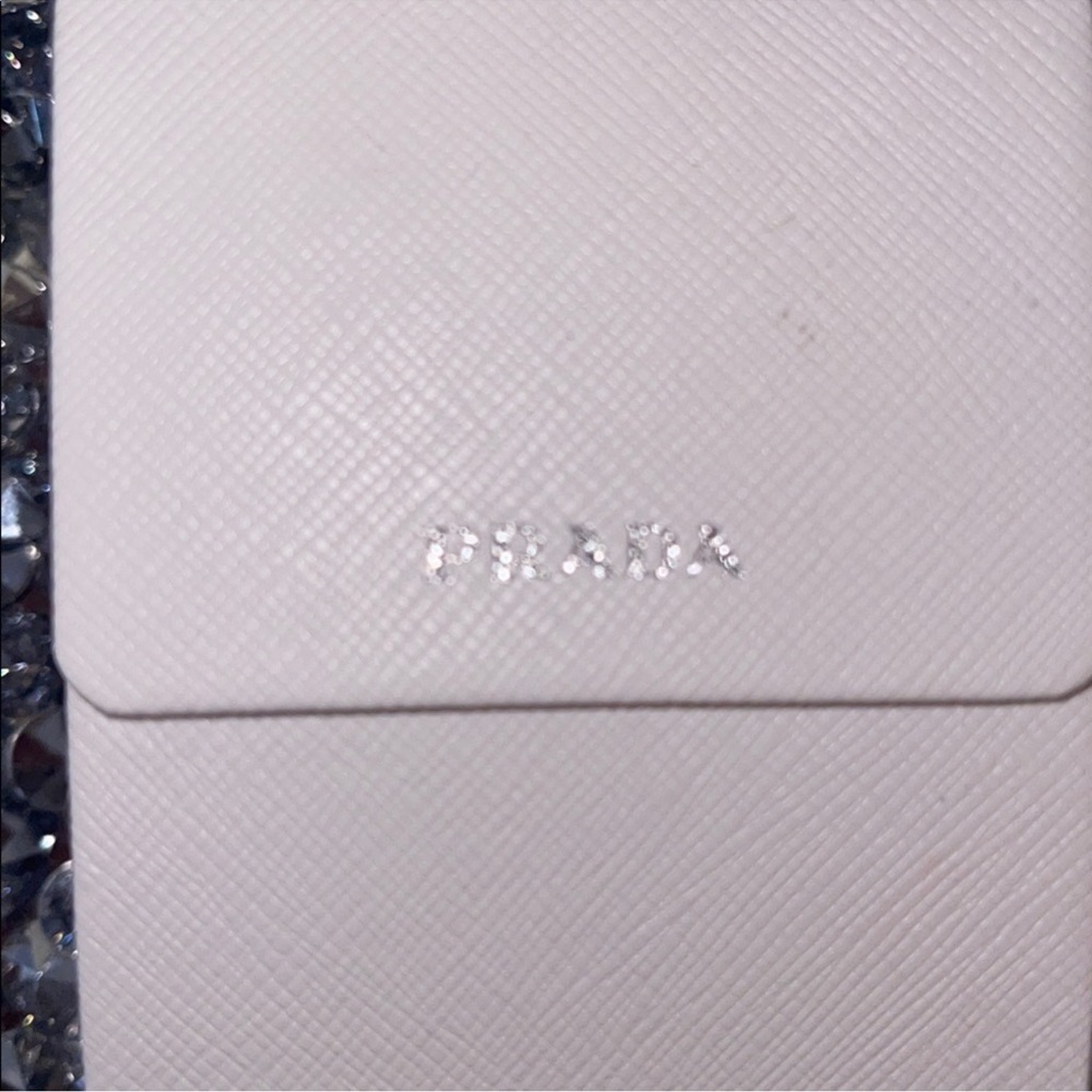 White Leather Sunglasses Case W/ New In Plastic Wipey + Card
Prada
$85 - Picture 3 of 6